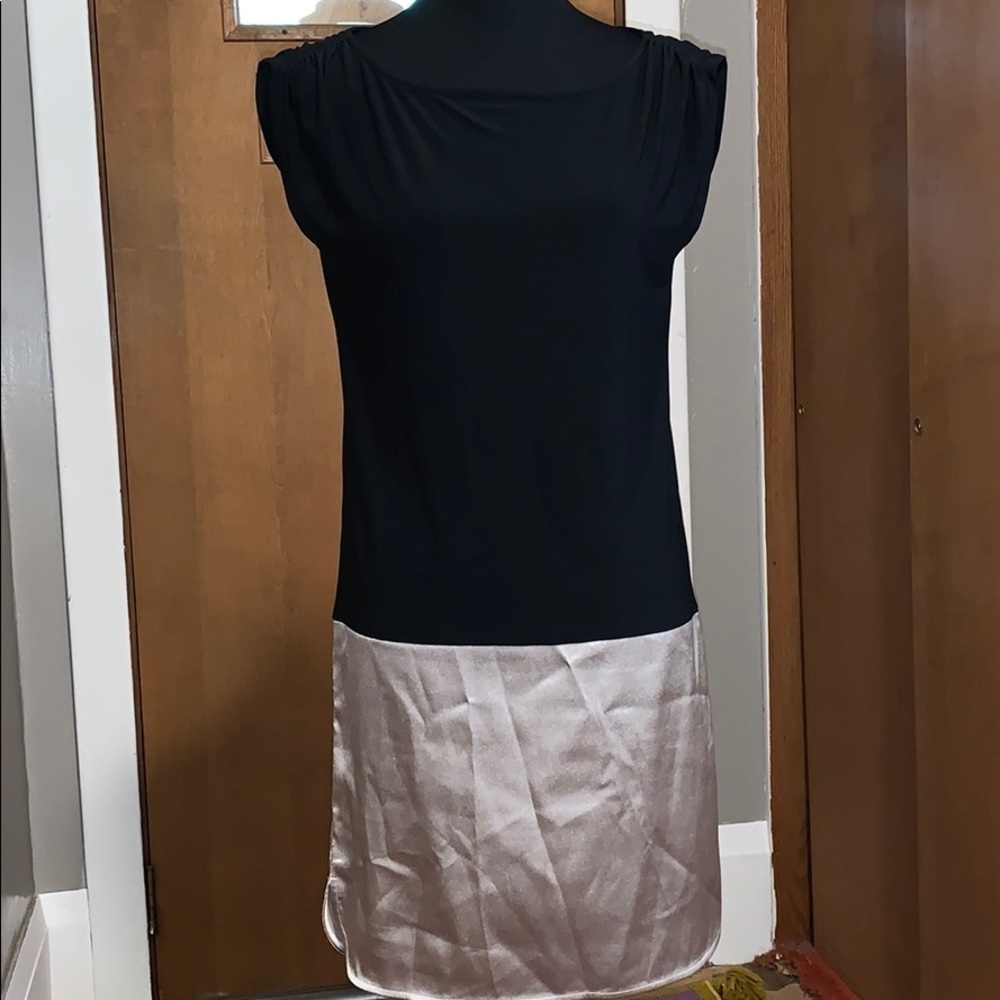The limited black and gold shift dress, size xs
